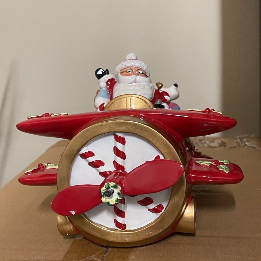 Fitz and Floyd Christmas Santa In Plane Figurine Music Box